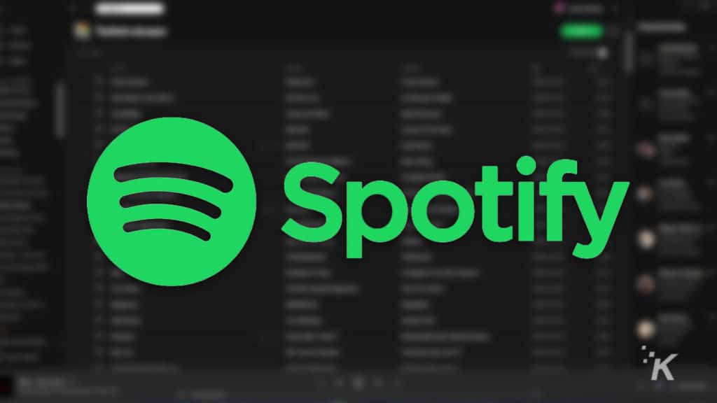 how to delete a playlist on spotify Spotify logo blurred background