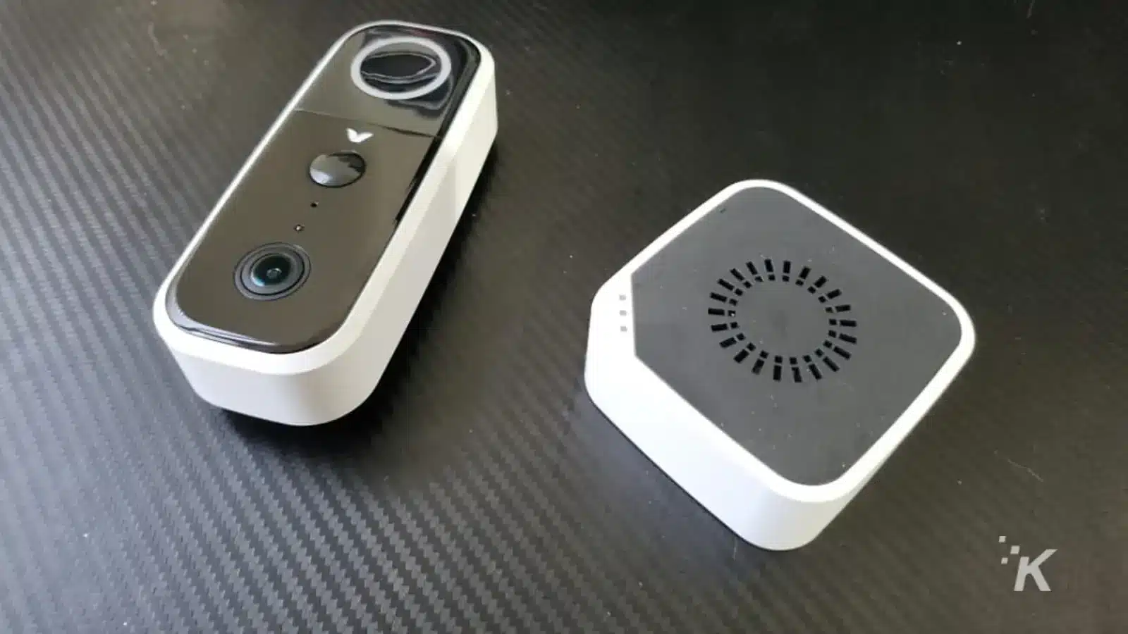 review: abode wireless video doorbell Adobe video doorbell on black desk