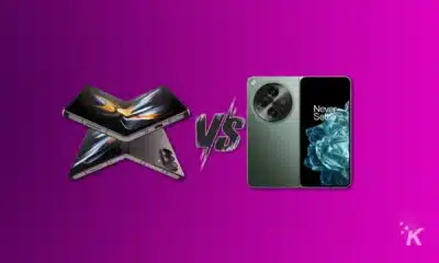 Renders of the samsung galaxy z fold 5 and oneplus open with "vs" between them