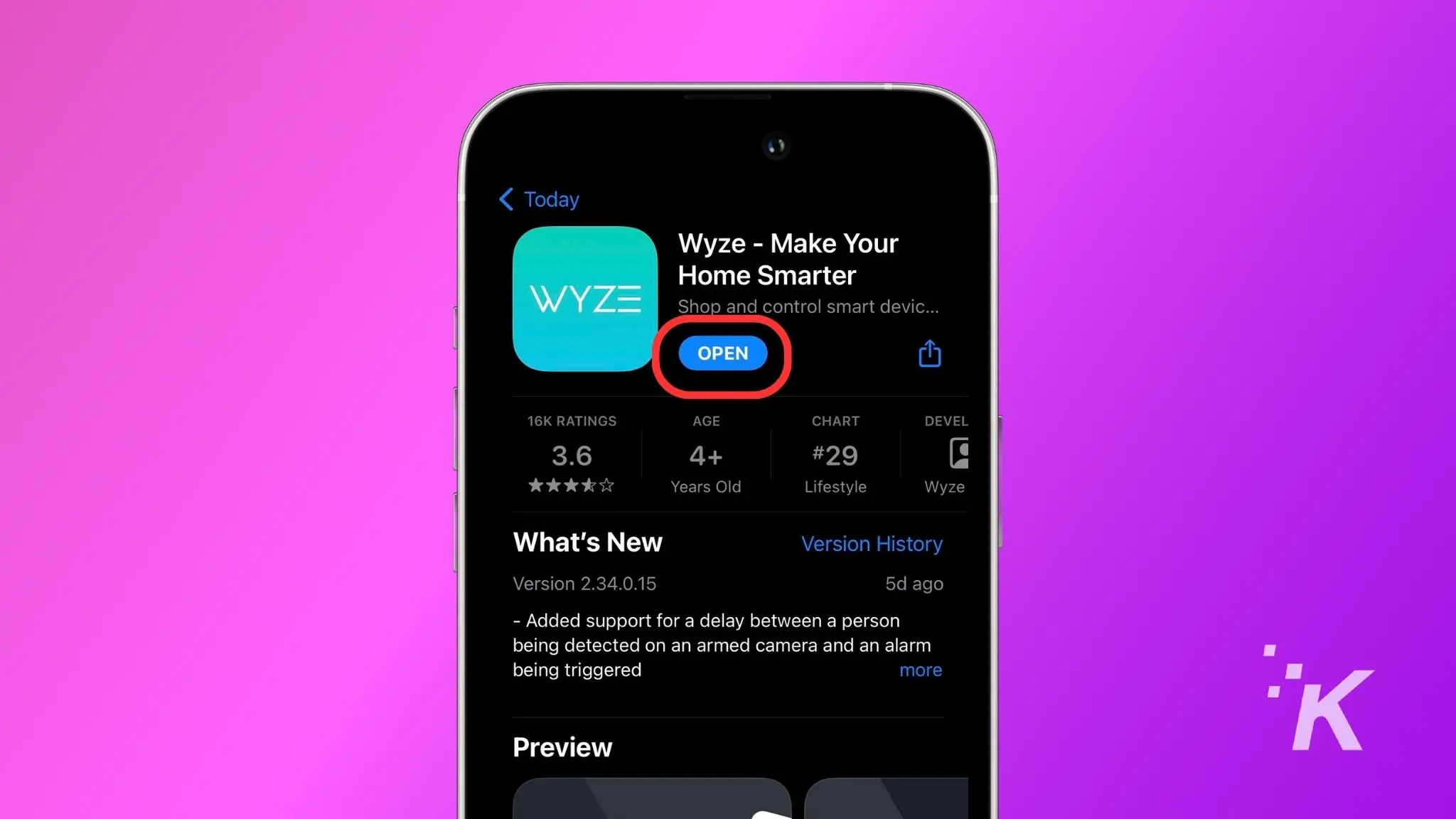how to connect a wyze camera to wi-fi A smartphone screen displaying the wyze app page on a digital store with an "open" button highlighted. Background is solid pink with a small 'k' logo.