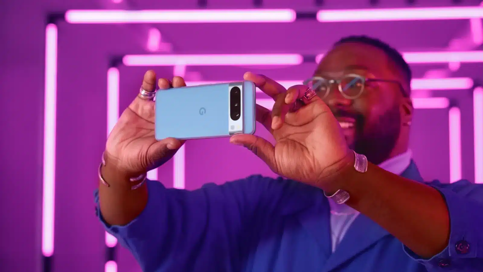 review roundup: google pixel 8 and pixel 8 pro A person takes a photo with a pixel 8