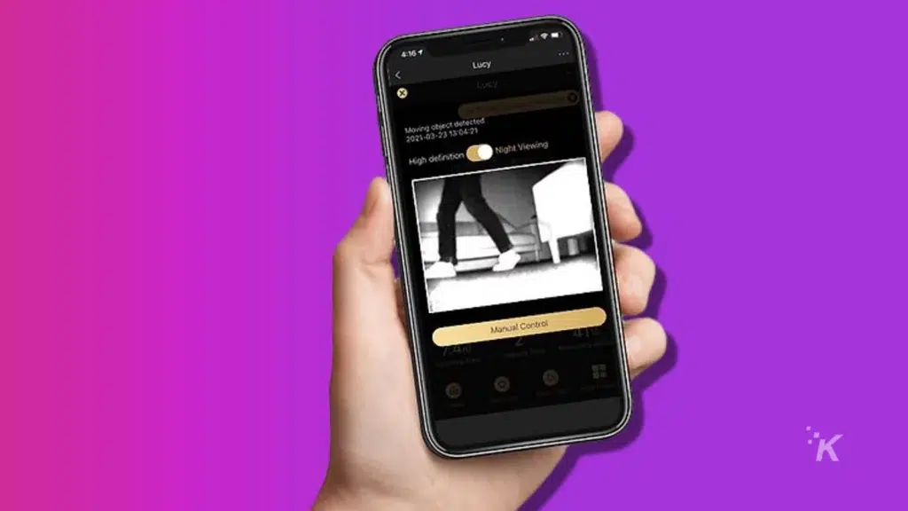 the lucy ultra robot vacuum is a pet owner's dream come true Image of a person holding a smartphone with a trifo lucy home app on smartphone