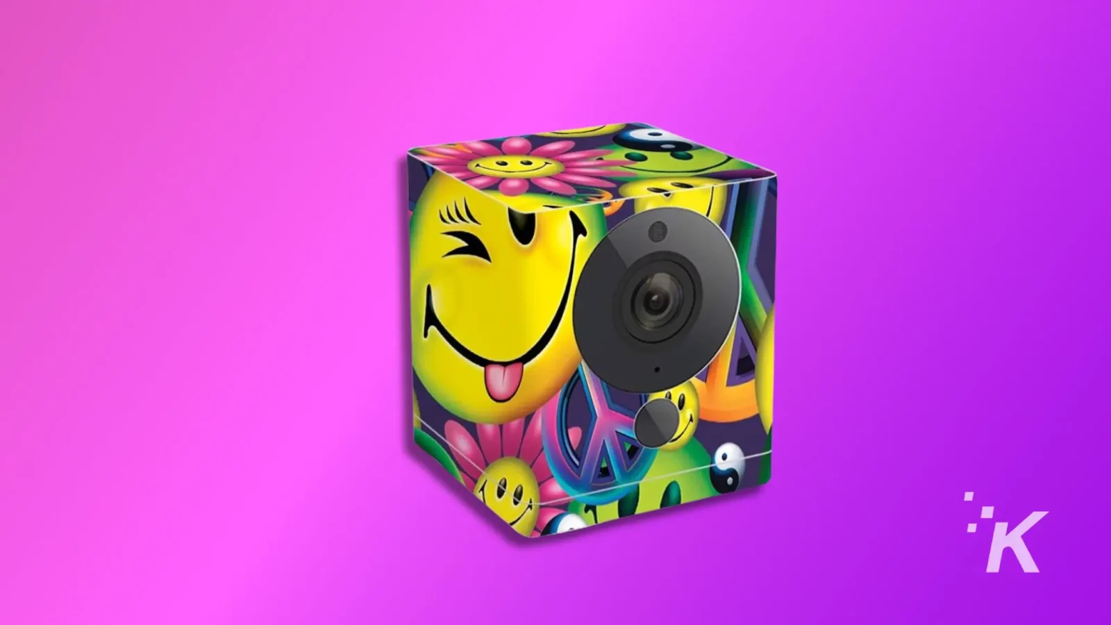 top 5 places to hide a wyze camera on your property A vibrant, cube-shaped speaker with a smiling face design and psychedelic colors on a pink background, symbolizing fun and music.